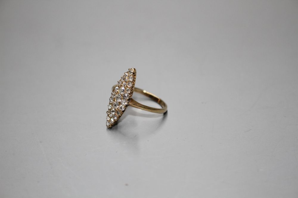 A yellow metal (tests as 18ct) and old round cut diamond set marquise cluster ring,